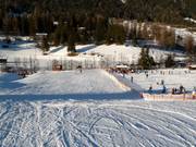 Breite und leichte Piste zur Talstation