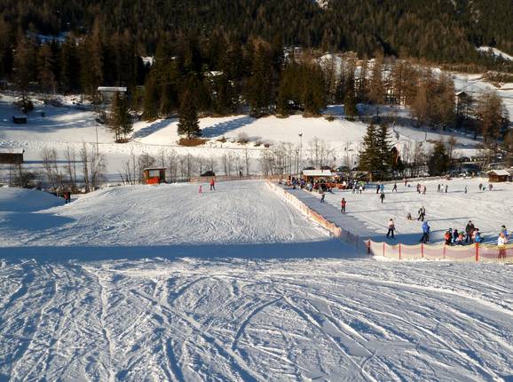 Breite und leichte Piste zur Talstation