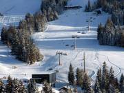 Schwandenbahn - 8er Hochgeschwindigkeits-Sesselbahn (kuppelbar) mit Abdeckhauben und Sitzheizung