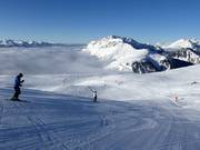 Skifahren über den Wolken im Skigebiet Alpe Lusia