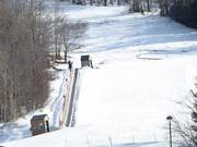Übungspiste mit Learn to Carpet an der Snowshed Lodge