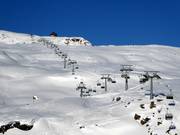 Lago Cavia-Col Margherita - 4er Hochgeschwindigkeits-Sesselbahn (kuppelbar) mit Abdeckhauben