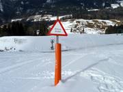 Schild auf der Piste