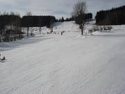 Breite und leichte Pisten auf der Rückseite