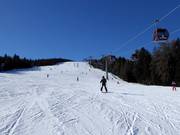 Leichte Piste an der 10er-Gondelbahn Kreischberg 2. Sektion