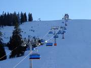 Waldkopf-6er-Sesselbahn - 6er Hochgeschwindigkeits-Sesselbahn (kuppelbar) mit Abdeckhauben und Sitzheizung