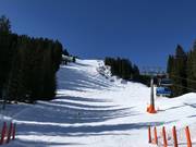 Piste und Skiroute an der Sesselbahn Sunnegg