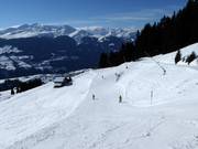 Blaue Piste von Alp Dado nach Crest Falla