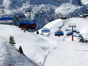 Hochalmbahn - 6er Hochgeschwindigkeits-Sesselbahn (kuppelbar) mit Abdeckhauben und Sitzheizung