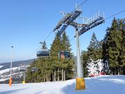 A. Kikirikiii - 6er Hochgeschwindigkeits-Sesselbahn (kuppelbar) mit Abdeckhauben