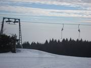 Kreuzhanglift - Schlepplift mit T-Bügel/Anker