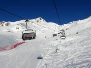 Contrabbandieri - 4er Hochgeschwindigkeits-Sesselbahn (kuppelbar) mit Abdeckhauben