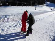 Hilfestellung am Übungslift