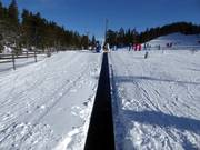 Förderband im Tandådalstorget Skidland