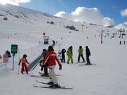 Skischulbereich beim Office du Tourisme in Le Corbier