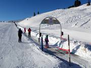 Kinderland Gerlos 2 (Arena Center) - Förderband/Zauberteppich