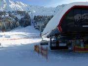 Wiedhagbahn - 6er Hochgeschwindigkeits-Sesselbahn (kuppelbar) mit Abdeckhauben und Sitzheizung