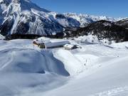 Blick auf den Speicherteich an der Alp da Munt